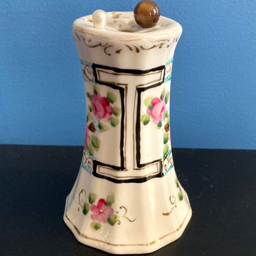 Antique Japanese floral hat pin holder with 2 pins